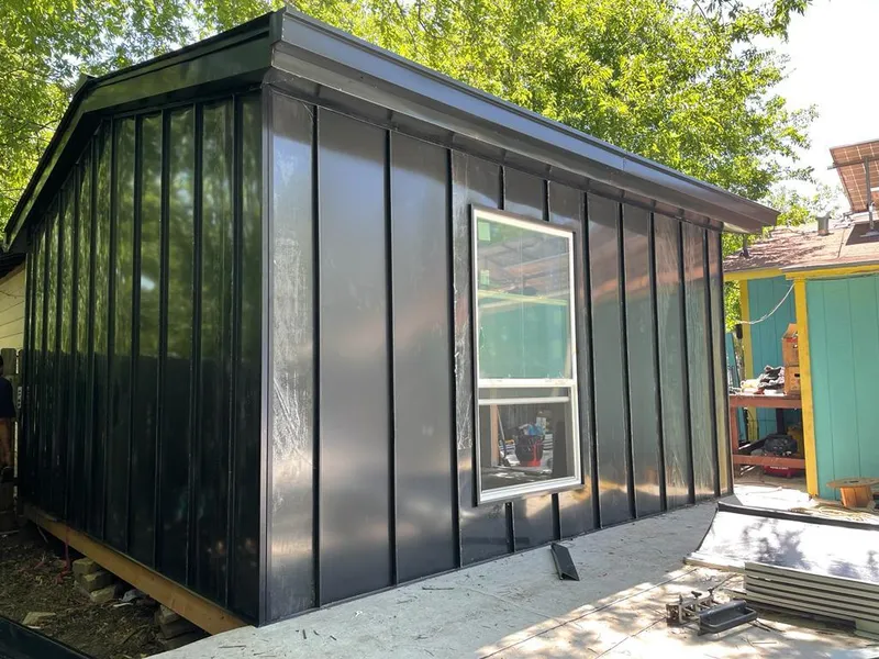 Black standing seam metal wall panels for Metal Roof Installation in Morton Grove