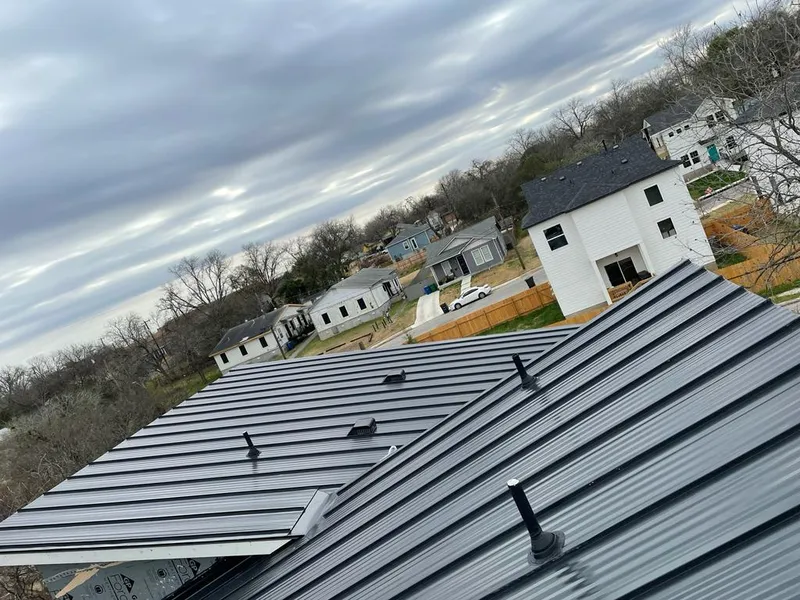 Standing seam metal roof panels with vents for Skylight Repair in Morton Grove